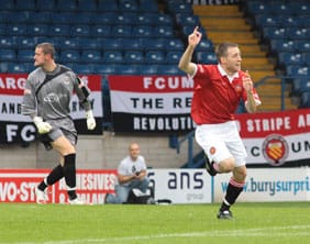Matthew Wolfenden celebrates putting FC United ahead. Pic: Dave Birt