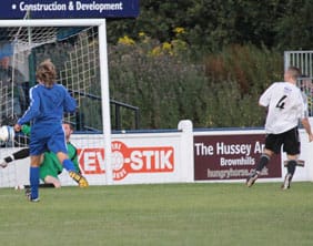 Richard Davies scores for Telford against Chasetown. Pic: Dave Birt