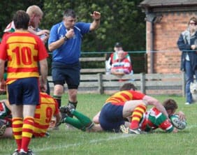 Lloyd Shelley crosses to score for Burntwood RUFC. Pic: Joanne Gough