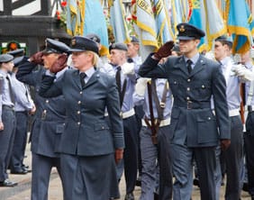 Flight-Lieutenant-Emma-Williams_-Officer-Commanding-Biddulph-Squadron_-leads-a-flight-of-the-Wings-32-banners_