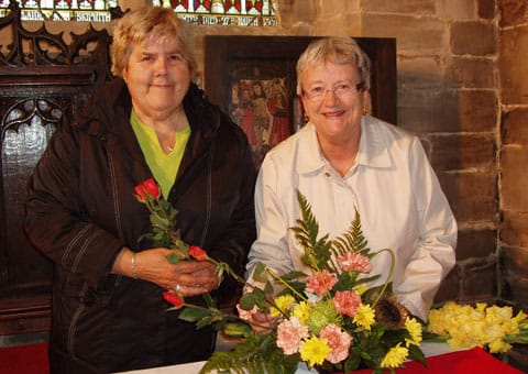 Members of the Hamstall Ridware flower arranging team working on one of the displays Members of the Hamstall Ridware flower arranging team working on one of the displays
