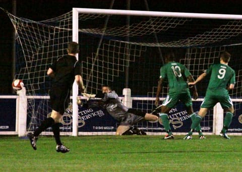 Chasetown keeper Ryan Price can't keep out Tom Bates' strike. Pic: Dave Birt