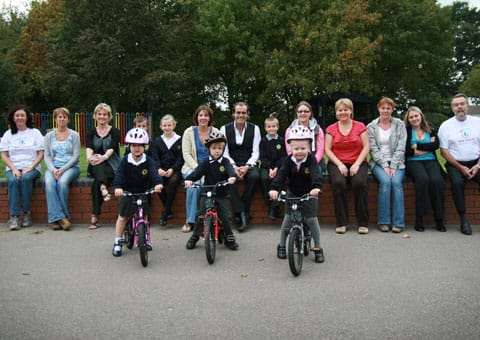 We Love Lichfield patrons - Simon Price, Cllr Helen Fisher and Cllr Ken Humphries - with children, parents and staff from Fulfen Primary