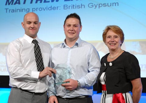 Matthew Lawrence (centre) picks up his prize Matthew Lawrence (centre) picks up his prize