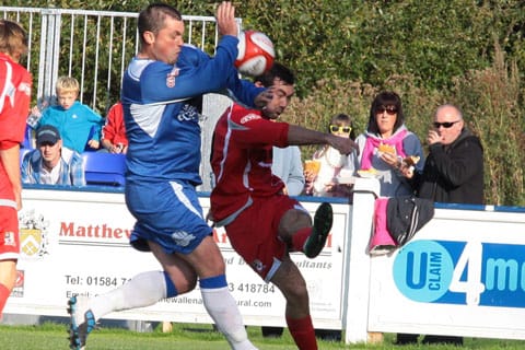 gary-birch-charges-down-the-ball