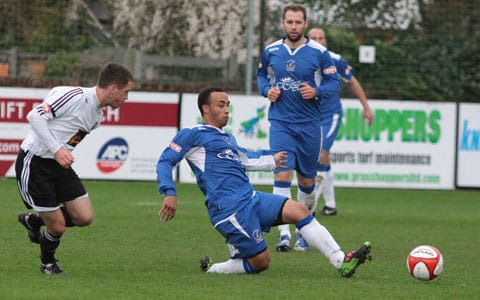 Levi Reid gets to the ball first for Chasetown. Pic: Dave Birt