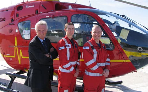 Tom Fanning with crew from the Midlands Air Ambulance in their new flight suits Tom Fanning with crew from the Midlands Air Ambulance in their new flight suits