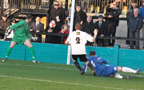 Paul Lundon fires past Chasetown keeper Ryan Price. Pic: Dave Birt Paul Lundon fires past Chasetown keeper Ryan Price. Pic: Dave Birt