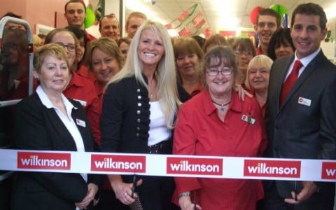 Kim Betts prepares to open the store with Wilkinson staff