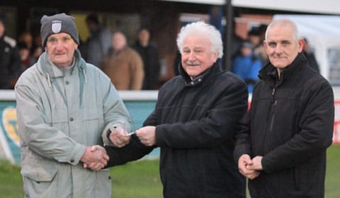 Mike Joiner hands over the cheque to Mervyn Rowe