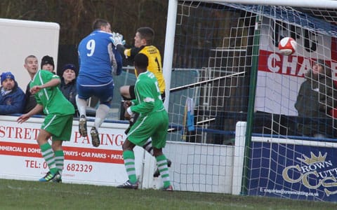 Gary Birch beats the keeper to the ball to give Chasetown the lead. Pic: Dave Birt