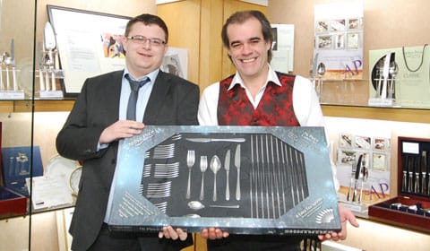 Howard Reeves receives his prize from Simon Price