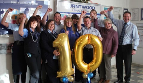 Staff celebrating Burntwood Leisure Centre's tenth birthday