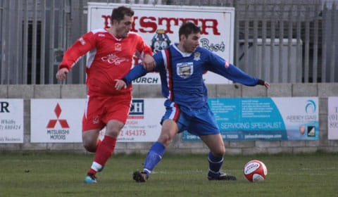 gary-birch-puts-pressure-on-the-whitby-defender