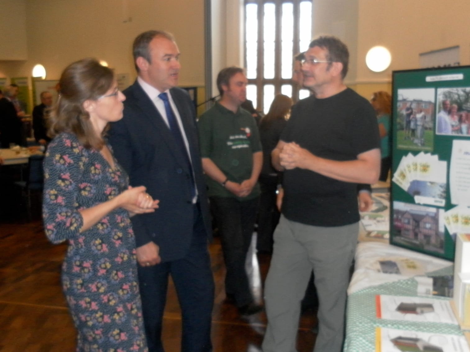 Kate Sadler (left) and Robin Tasker (right) talk with Ed Davey about the Goverment's Green Deal initiative Kate Sadler (left) and Robin Tasker (right) talk with Ed Davey about the Goverment's Green Deal initiative