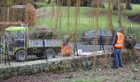 The Community Payback team working on the railings The Community Payback team working on the railings