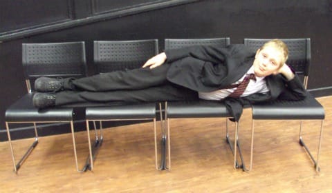 A student tries out the new chairs