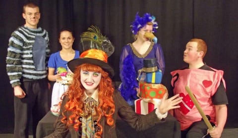 Scott Harrison as the Cheshire Cat (Judas), Natasha Pryjmachuk (costume designer) dressed as Alice (disciple), Amanda Pinson as the Mad Hatter (Jesus), Lydia Clements as the Dodo (James) and Ashley Booker as a Card Guard (Malchus) Scott Harrison as the Cheshire Cat (Judas), Natasha Pryjmachuk (costume designer) dressed as Alice (disciple), Amanda Pinson as the Mad Hatter (Jesus), Lydia Clements as the Dodo (James) and Ashley Booker as a Card Guard (Malchus)