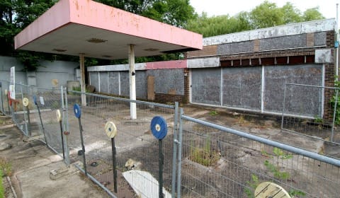 The derelict filling station site in Barton-under-Needwood