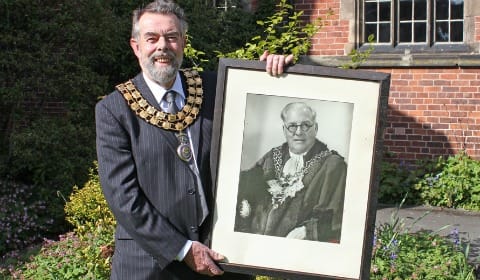 Cllr Ken Humphreys with a picture of his grandfather Hubert Humphreys