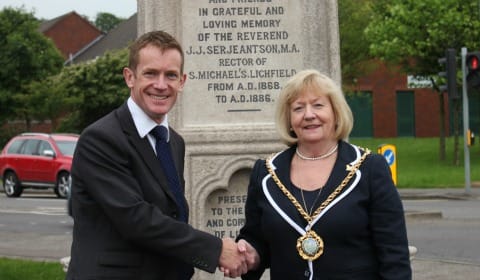 Cllr Alan White and Cllr Janet Eagland in front of the Serjeantson Fountain