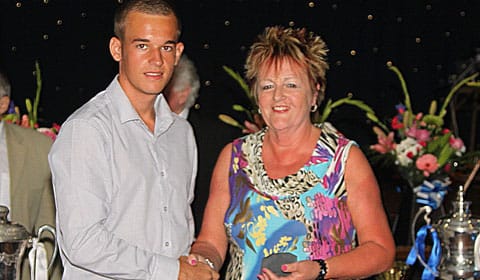 jenny_smith_presents_oliver_james_with_his_managers_player_of_the_yearaward_for_chasetown_scholarship_scheme