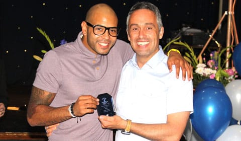 new_manager_craig_chopper_harris_presents_jimmy_turner_withthe_managersplayer_of_the_season_trophy