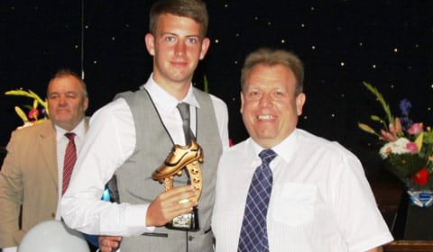 scholarship_star_jed_davis_recieves_his_players_player_of_the_year_awardfom_andy_cox