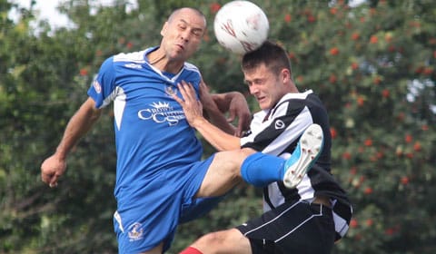 Gary Hay battles for the ball in the air. Pic: Dave Birt
