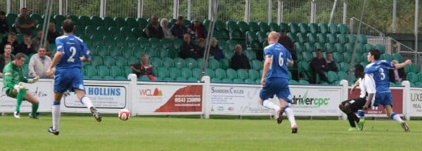Edwin Asante-Ahenkorah slots past Ryan Price to give Rocester the lead. Pic: Dave Birt