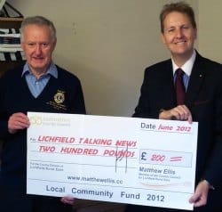 John May receives a cheque from Cllr Matthew Ellis