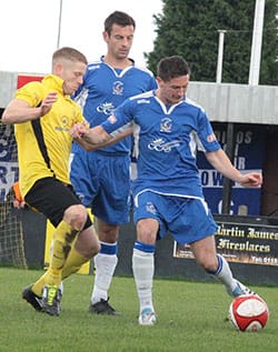 matt-jackson-clears Matt Jackson clears the ball under pressure. Pic: Dave Birt