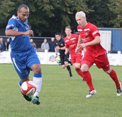 Simon Brown gets away with the ball. Pic: Dave Birt