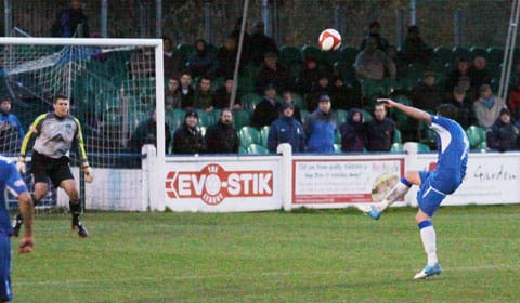 Scott Rickards lobs the keeper to net Chasetown's sixth goal. Pic: Dave Birt