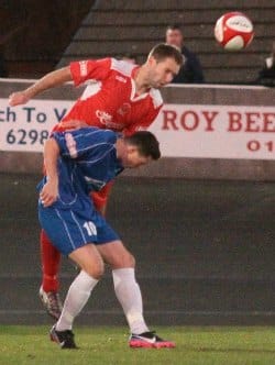 Chris Slater climbs highest to win the ball. Pic: Dave Birt