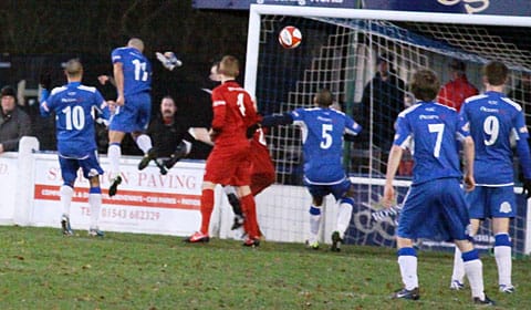 Theo Robinson heads home his second goal against Stamford. Pic: Dave Birt