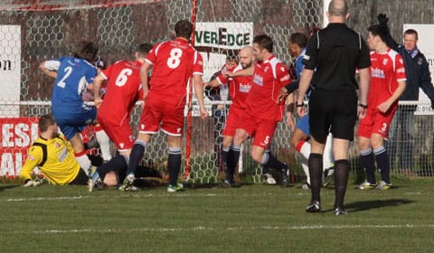 Jack Farmer bundles the ball home. Pic: Dave Birt