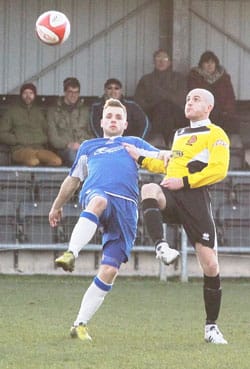 Chasetown debutant Joel Purkiss battles for the ball. Pic: Dave Birt