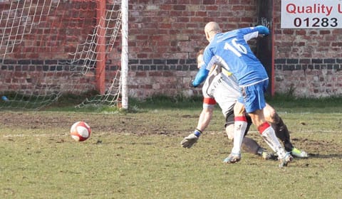 Gary Hay makes it 3-1 to Chasetown at Gresley. Pic: Dave Birt