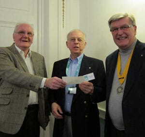 Ken Sharman and Mike Cook hand over the cheque to ShelterBox