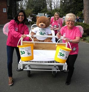 Participants get ready to go for the St Giles Hospice bed push