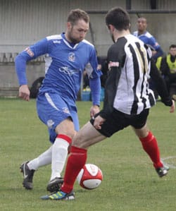 Chris Slater beats his man. Pic: Dave Birt