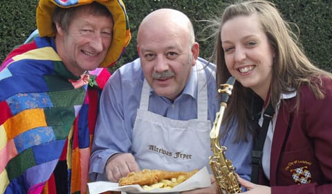 John Phillips from Lichfield Mysteries, with Chris Christoforou, owner of the Alrewas Fryer, and Natalie Foster, saxophonist with the City of Lichfield Concert Band