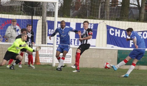 Nick Wellecomme scores against Brigg Town. Pic: Dave Birt