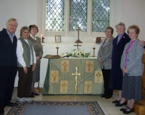 Embroidery group members Ken Whinnray, Pauline Larner, Barbara Marshall, Nicola Buffin, Bette Hanson and June McDearmid with the new altar frontal
