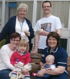 Pauline Spratt (Hospital League of Friends) with the Walker family and Sister Irena Waldron