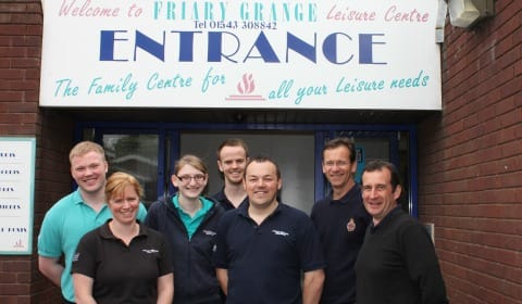 Leisure Centre Manager Phil Kelly (far right) with leisure centre staff celebrating outside the current entrance