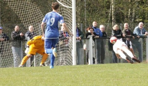 Sam Carline heads into his own net. Pic: Dave Birt