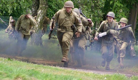 US troops advance during a re-enactment at the Staffordshire Regiment Museum