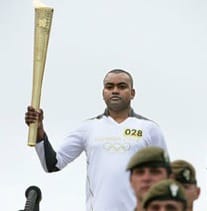 Corporal Johnson Beharry VC with his Olympic Torch